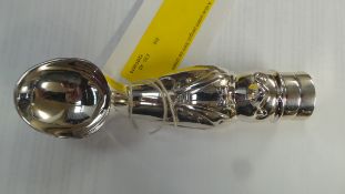 A silver plated penguin form ice cream scoop