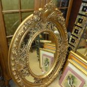 A French classical design gilded oval wa
