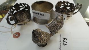 An Egyptian silver salt and pepper in th