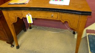 A Biedermeier design burr elm veneered desk with single drawer on splayed supports