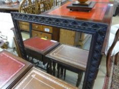 A wall mirror the rectangular plate with