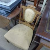 An Edwardian inlaid satinwood nursing ch