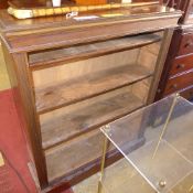 A Victorian mahogany open bookcase with open shelves on plinth base