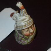A C19th porcelain Worcester snuffer