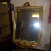 A green painted walk hanging mirror with