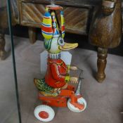 A Tinplate model toy with duck wearing a propeller