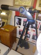 An adjustable telescope on stand