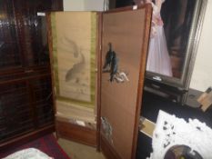 A Japanese embroidered two fold screen a