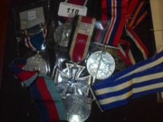 A collection of WWII medals including an