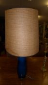 A studio pottery mottled blue table lamp