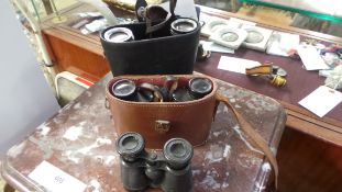 A collection of binoculars two cased