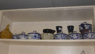 A collection of blue and white soup tureens and covers and various other pottery