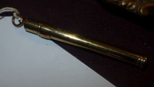 A 9ct gold propelling pencil