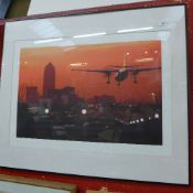 A coloured print of an aeroplane and a p