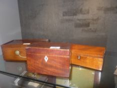 A C19th mahogany tea caddy and two other