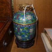 A cloisonne and gilt metal urn and cover