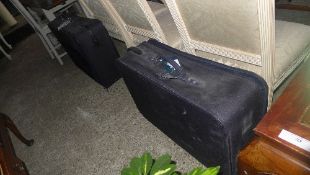 A pair of Marco Polo suitcases