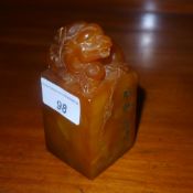 A Chinese soapstone seal carved with a mythical creature
