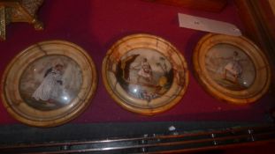 A set of three C19th Italian miniature paintings on convex glass of mythical scenes in circular