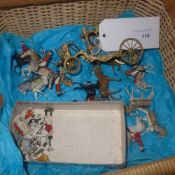 A 1950's set of painted lead figures depicting the Queen's coronation coach together with a