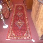 A fine North West Persian Malayer runner 280cm x 80cm triple pole medallion with repeating motifs on