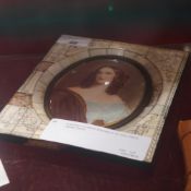 A portrait miniature of a lady in an ivory frame, signed Stieler