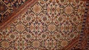 A Bidjar design carpet with a medallion surrounded by many borders 280 x 200 cm