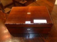 A Victorian rosewood writing slope with inlaid panel door opening to reveal four drawers