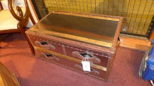 An aluminium leather and wood bound trunk with leather strap handles