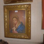 A C19th watercolour of the Madonna glazed and in giltwood and gesso frame