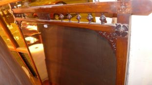 A Victorian oak overmantle mirror of large proportion mirror of large proportions with turned