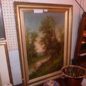 A late C19th gilt framed oil on canvas of a river and trees signed A De Simone