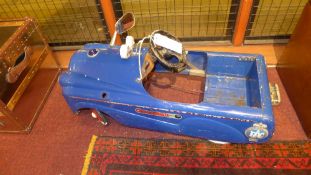 A C1960's blue painted 'Deluxe' pedal car (A/F)