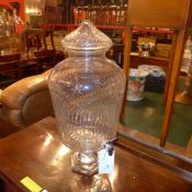A cut glass lidded punch barrel with tap