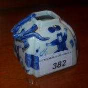 A C19th Chinese blue and white water pot decorated with chi dragons with a four character mark to