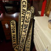 A collection of seven wooden replica London road signs including Columbia Road and Carnaby Street