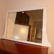 A C19th white painted overmantle mirror with bevelled plate