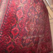A fine North East Persian Meshad Belouch rug   195 x 110 cm  repeating panel motifs guarded by