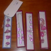 A sterling silver and druzy necklace a similar bracelet a sterling silver and pink stone necklace