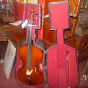 A C20th cello labelled Guissepe Marvelli, length of back  76.5cm with bow in a fitted hard case