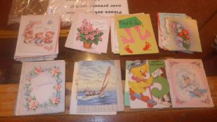 A collection of fifty old greetings cards, unused
