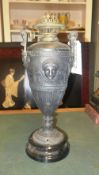 A classical champagne urn spelter lamp base on turned support