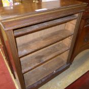 A Victorian mahogany open bookcase with open shelves on plinth base