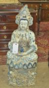 An Oriental porcelain model of a deity