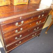 A Georgian mahogany bachelors chest with brush slide four graduated drawers bracket feet