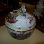 A Meissen style tureen with pictorial relief