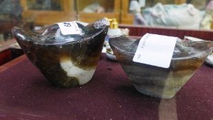 A pair of Quartz paperweights