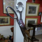 A set of oversized novelty scissor