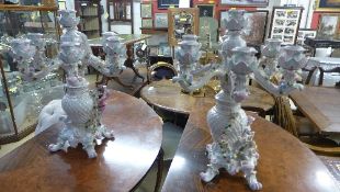 A pair of Meissen design six branch candelabra