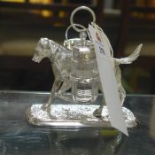 A silver plated dog form cruet holder